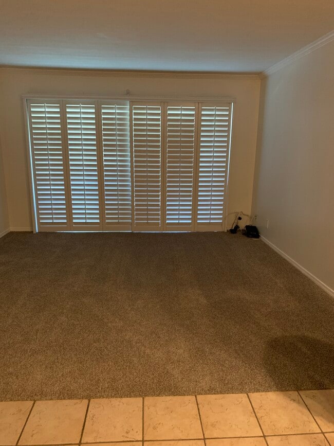 Living room brand new carpet and paint Sliding doors to deck - 436 N Bellflower Blvd Unit 218