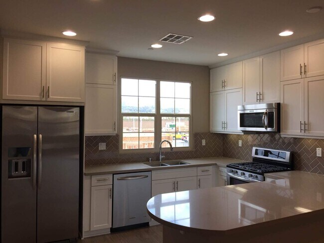 Photo - Amazing 4 Bedroom/3.5 Bathroom Townhome