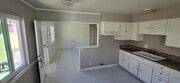Kitchen facing living room - 23401 Catskill Ave Unit Duplex Rear