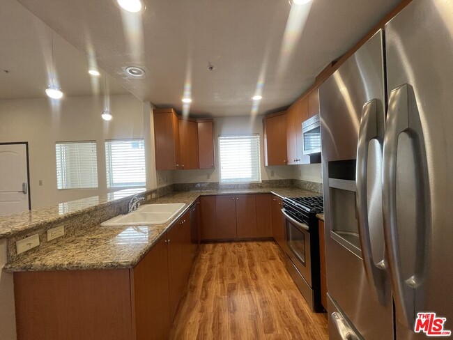 Photo - 15024 Magnolia Blvd Unit 104