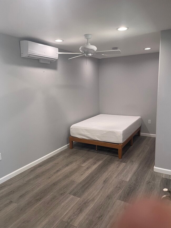 Opposite of TV Wall. This is a new double bed-a queen size also fits. - 33742 Alcazar Dr Unit Studio- C