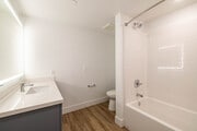 3BR, 2BA - 1,295SF - Bathroom - Lumia Apartments