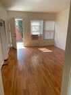 Living room - 14156 Calvert St Apartments Unit 14156