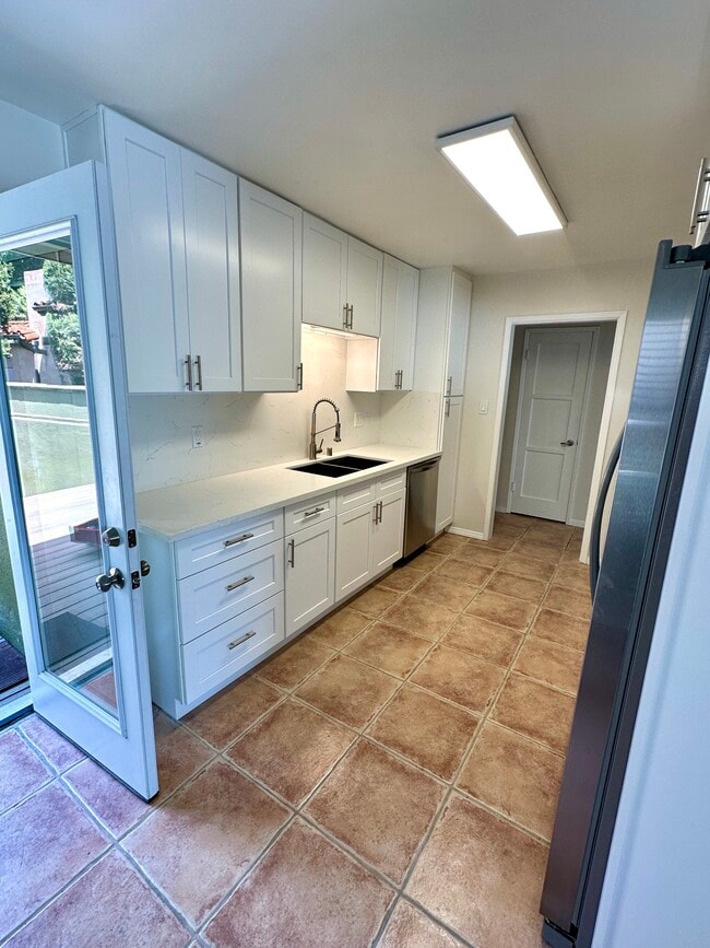 New cabinets and countertop - 1033 Pearl St Unit Front