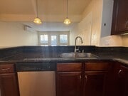 Photo - Upgraded Condo with Private Patio, AC, Pool, Gym, and Covered Parking in Gated Community