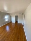 Livingroom - 13616 Penn St House Unit half