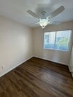 Photo - 2BR/1BA Lakeside ground floor condo with 1 car detached garage, 1 uncovered parking space & commu... Unit A