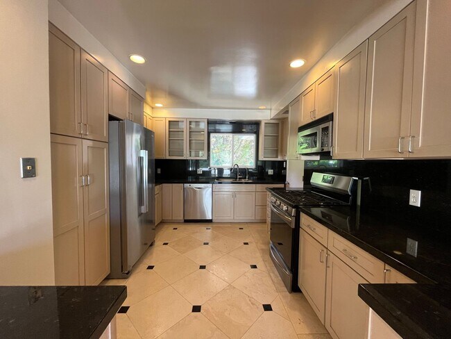 Photo - A hidden gem with tree-top view. Tranquil and private. Light and airy