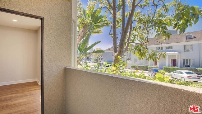 Photo - 5557 W 6th St Unit 2-201