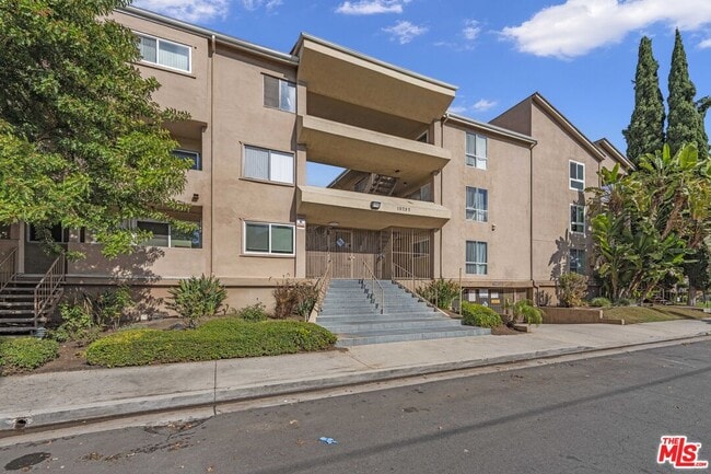 Building Photo - 10757 Hortense St Unit 303