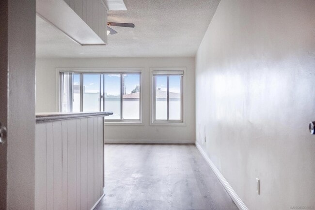 Building Photo - 7555 Linda Vista Rd Unit 9
