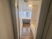 Bath - Wall hung vanity, tub with curved rod - 1261 1/2 S Plymouth Blvd Unit 1261.5