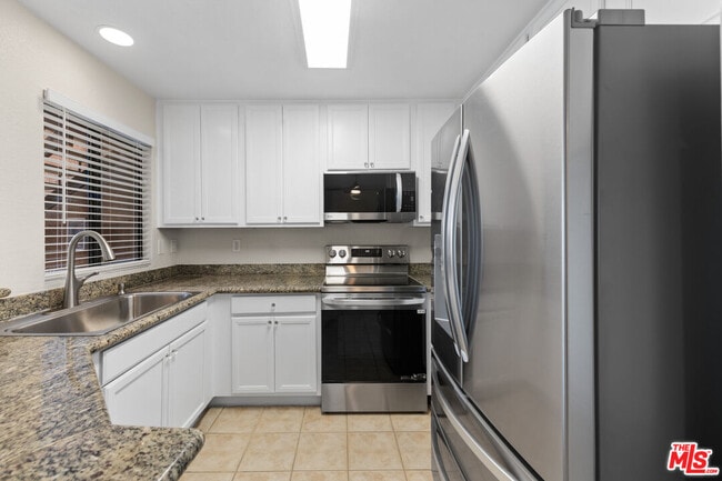 Photo - 78650 Ave 42 Ave