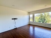 Integrated media wall with concealed wiring and pre-installed TV mount. - 1672 Rotary Dr