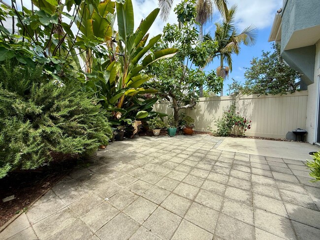 Photo - Spacious 3 Bedroom 2.5 Bath Townhouse with Private Garden Patio & a Community Pool/Spa! Attached ...