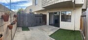 Private back yard/patio with string lights - 16622 Jib Cir Unit #2