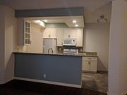 Kitchen view from living room - 10021 Tabor St Condo Unit #206