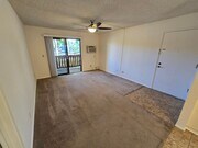 Photo - Move-In Special: 1/2 off 1st Month's Rent!!!  Freshly Painted 1-Bedroom Condo with Covered Parking Unit 93