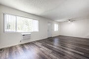 2BR, 2BA - 900SF - Living Room - Lakewood Gardens Apartments