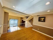 Living Room From Dining - 10201 Mason Ave Townhome