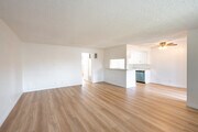 2BD, 1BA - 1,075SF - Living Room - Oasis Apartments