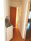 Hallway with Granite Bar area off of Living Room pocket door can slide closed - 108 N Hayworth Ave Apartments Unit 4