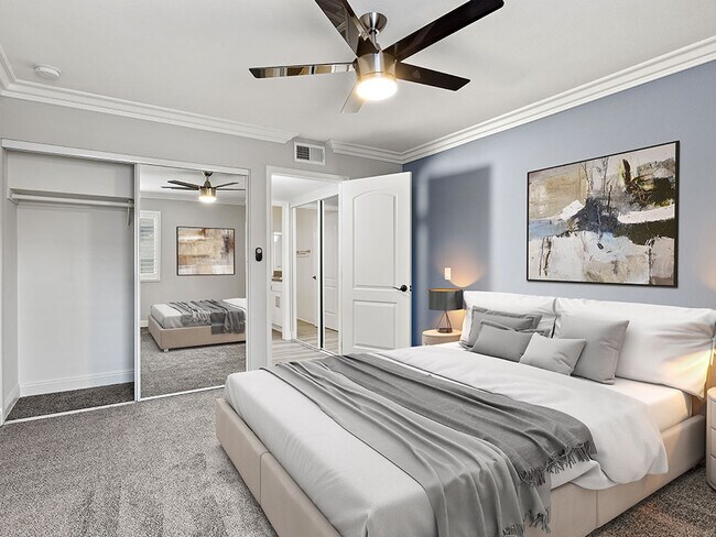 Large bedroom with ceiling fan. - Hughes Regency