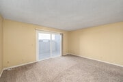 2BR, 2BA - 1,100SF - Living Room - Sea Breeze Townhome Apartments