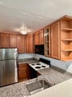 Granite counters, dishwasher, updated kitchen - 608 Idaho Ave Unit 7