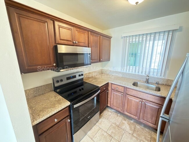 Building Photo - 4477 Mentone St Unit 202