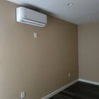 2 mini splits in bedroom and livingroom - 110 E 76th Pl Unit 110