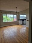 Dining room w/open kitchen - 1647 Angelus Ave Apartments Unit 1647 Angelus Ave