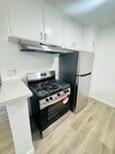 UNIT #3 KITCHEN - 19419 Victory Blvd Apartments