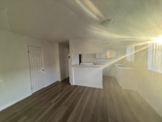 Living Room / Kitchen - 525 Jacmar Dr Apartments Unit B