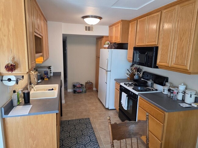 Photo - Large 4 bedroom 2 bath home with downstairs bedroom and attached garage