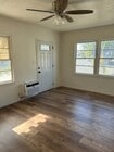 Living room front door - 610 S Main St Apartments Unit D