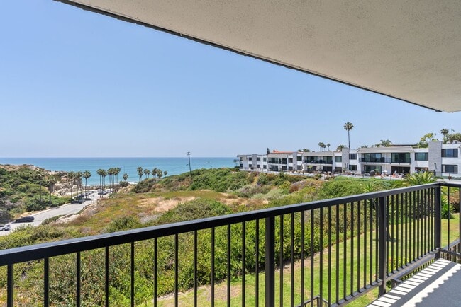 Building Photo - Live in Luxury: Spacious Sanctuary - Oceanfront Condo View Home with Mesmerizing Pacific Views