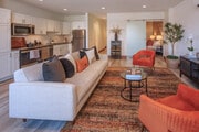 1BR, 1BA - 833SF - Living Room - Ocean Center Apartments