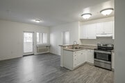 2BR, 2BA - 888SF - Kitchen, Living Room - Harbor Grove Apartments