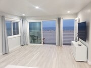 open door and open sliding door - 72 The Strand Unit OCEANFRONT