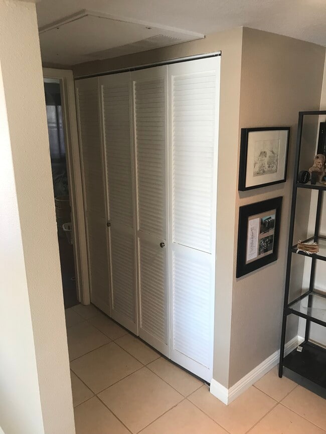 Washer and dryer closet - 1335 Newport Ave Unit 205