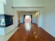 Living Room and Dining Room - 7102 Phelps Rd Townhome
