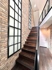 Entry level stairs leading to 2nd story - 7870 Civita Blvd Townhome