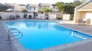 Photo - Stunning 4BR Townhome with Hardwood Floors, Private Patio, Community Pool & 2-Car Garage!