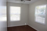 Bedroom with one window facing Prospect and one facing the alley - 4435 E Ocean Blvd Unit 4