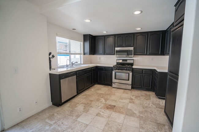 Photo - Charming 3-Bedroom Townhome with Dual Fireplaces and Pool Access in Stevenson Ranch!