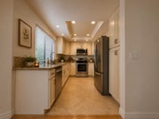 Photo - Spacious 4 Bedroom House with Large Fenced Yard! Landscaping Included! Two Car Garage!