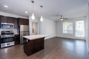 2BR, 2BA - 1,063SF - Living Room - Metro at Main