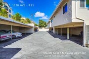 Covered parking - 6107 - 6117 11th Ave Apartments