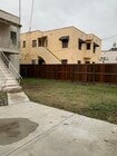 Apartment Entry In Backyard Of Building - 824 1/2 S Curson Ave Apartments Unit 824 1-2